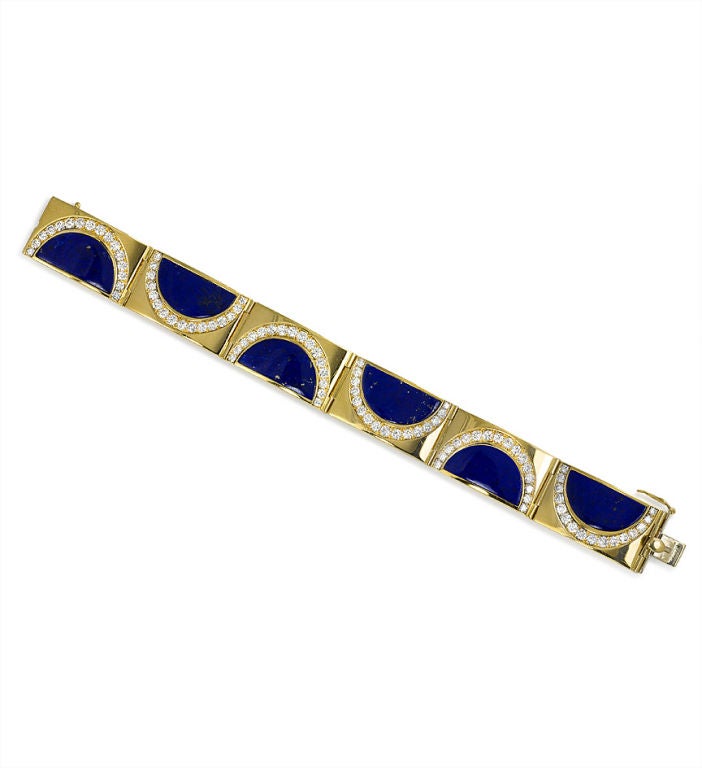 A gold, lapis and diamond bracelet, composed of inlaid half moon designs on curved panels, in 18k. Bulgari.