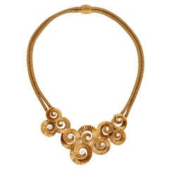 Diamond and Gold Necklace With Swirl Bib