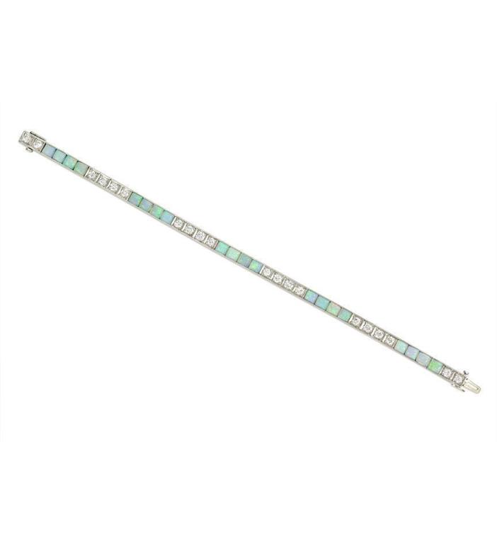 An Edwardian Opal Diamond Line Bracelet