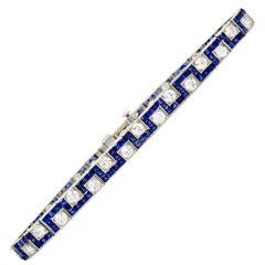 An Art Deco J.E. Caldwell Diamond, Sapphire and Platinum Bracelet