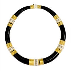 An Onyx, Diamond and White Coral Necklace