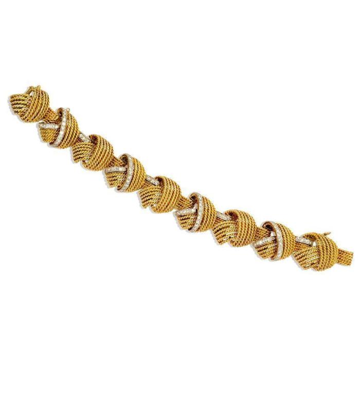 A gold rope twist and single-cut diamond bracelet comprising nine knotted links, in 18k.  Atw 2.20 cts.; 50.9 dwt.