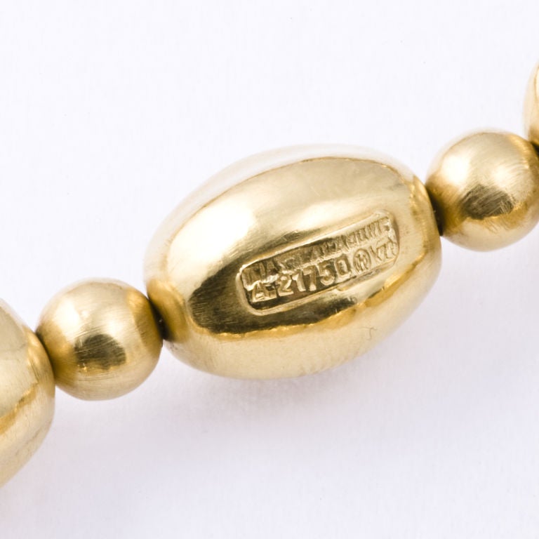 Soothing to the touch handmade satin finish 22kt. yellow gold Lalaounis necklace, measuring 31
