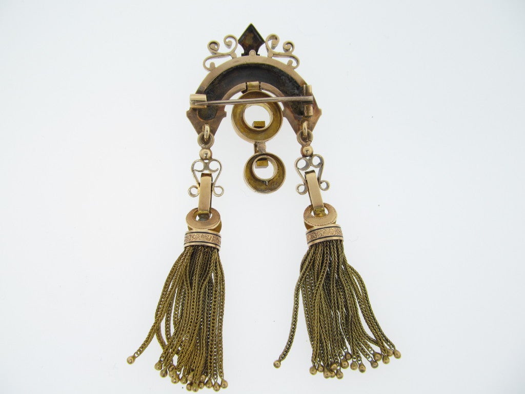 Antique Victorian brooch with double tassel drops, black enamel and 5 natural pearl detail the brooch measures an impressive 3 1/2