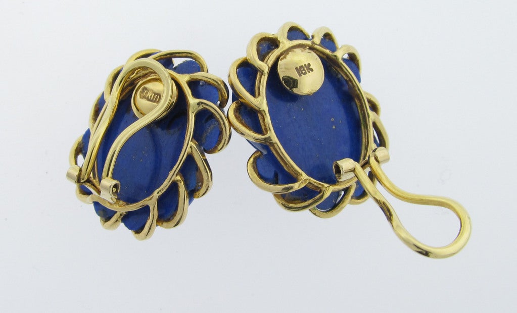 18kt. yellow gold mount carved Lapis Lazuli earrings with omega backs signed Trio. Posts may be added.