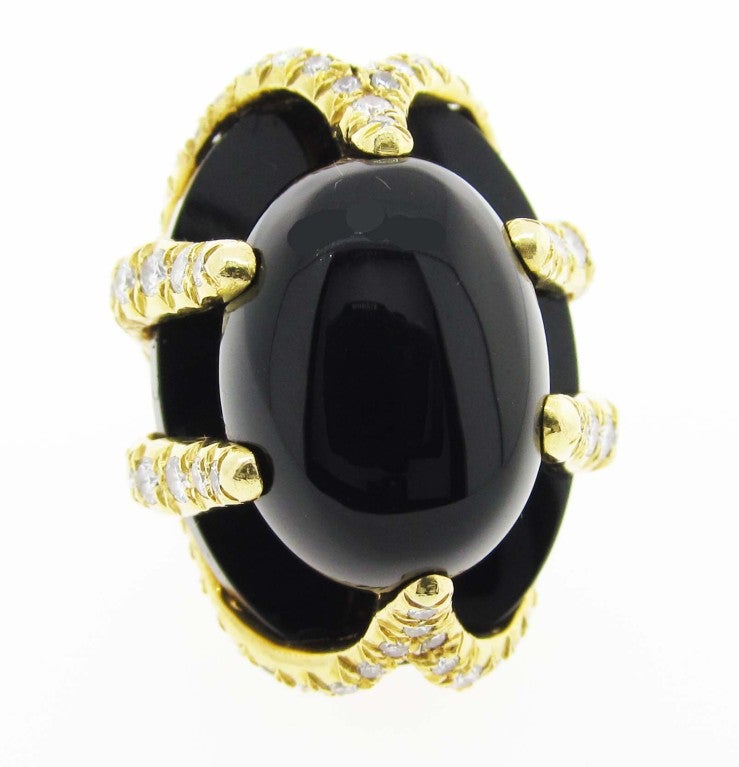 Unique Barbara Anton black onyx and diamond ring in a handmade 18kt. yellow gold mount. The organic mount is bead set with 79 round brilliant cut diamonds totaling approx. 1.25cts. Size 6 1/2 and may be sized.