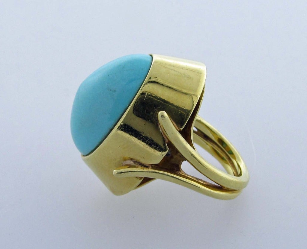Bold 18kt. heavy mount robin egg blue turquoise ring. The turquoise measures 31mm. X 24.5mm. The ring is size 6 1/2 and may be sized and is signed Cellino.