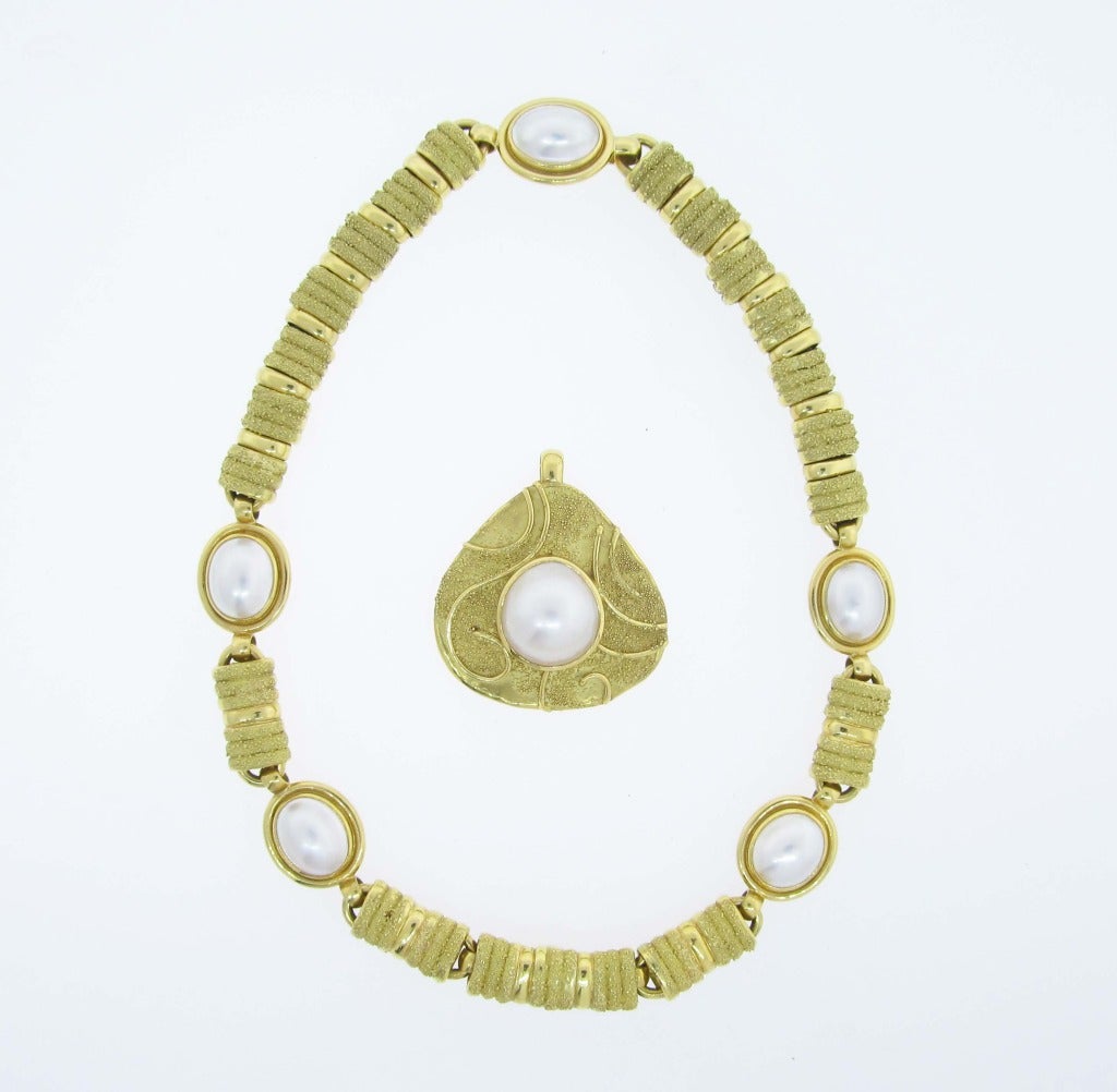 Elizabeth Gage 18kt. sand and high polish yellow gold necklace with removable 1  1/2
