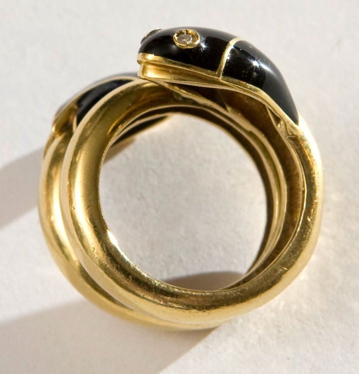  20th Century double headed black enameled snake ring with diamond eyes in 18kt gold 1