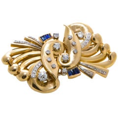 18 kt French clips with diamonds and sapphire baguettes