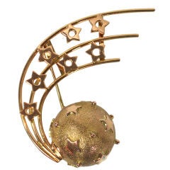 Unique gold comet and shooting star brooch