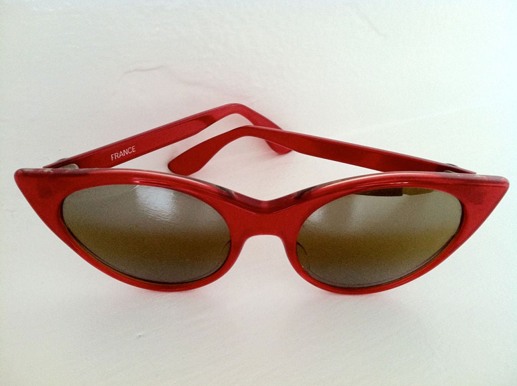 Fine & rare vintage Vuarnet PX 'Cat-eyes' sunglasses. Vibrant red plastic item with original glass lenses.