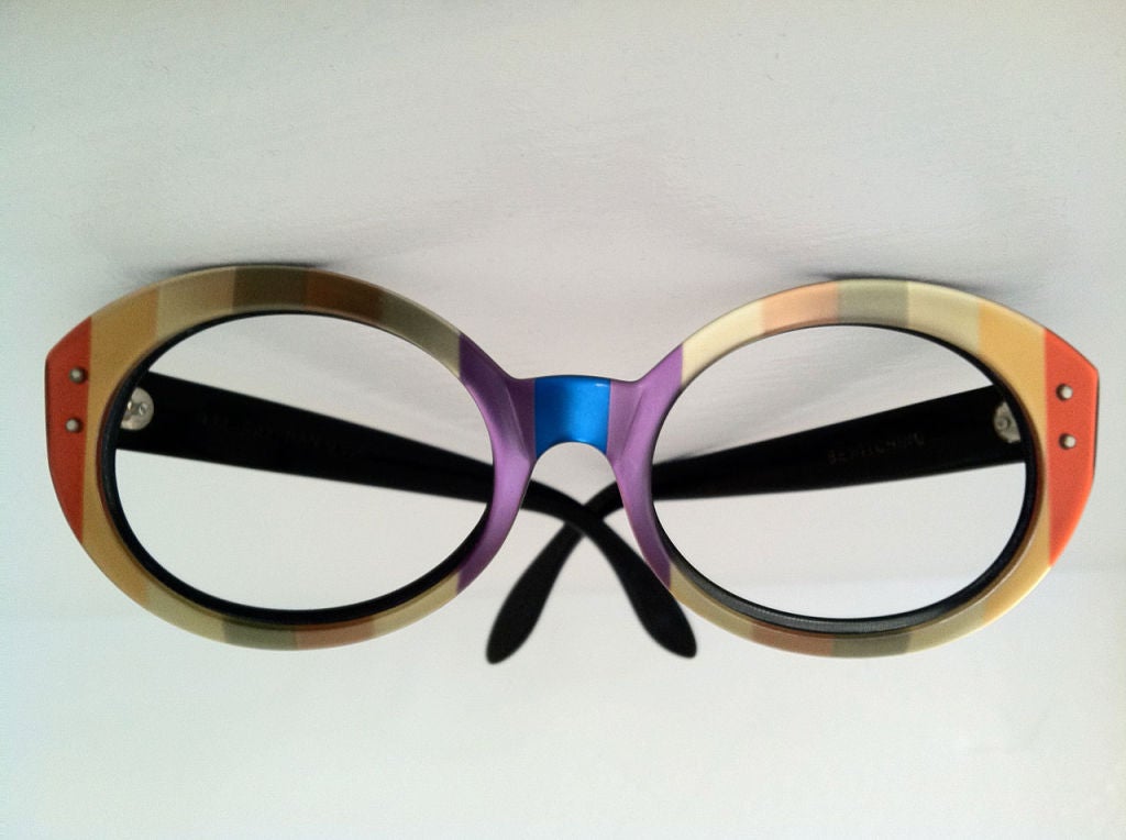 Fine vintage Ray Ban 'Bewitching' eyeglass frames. Authentic multi-colored laminated plastic item.