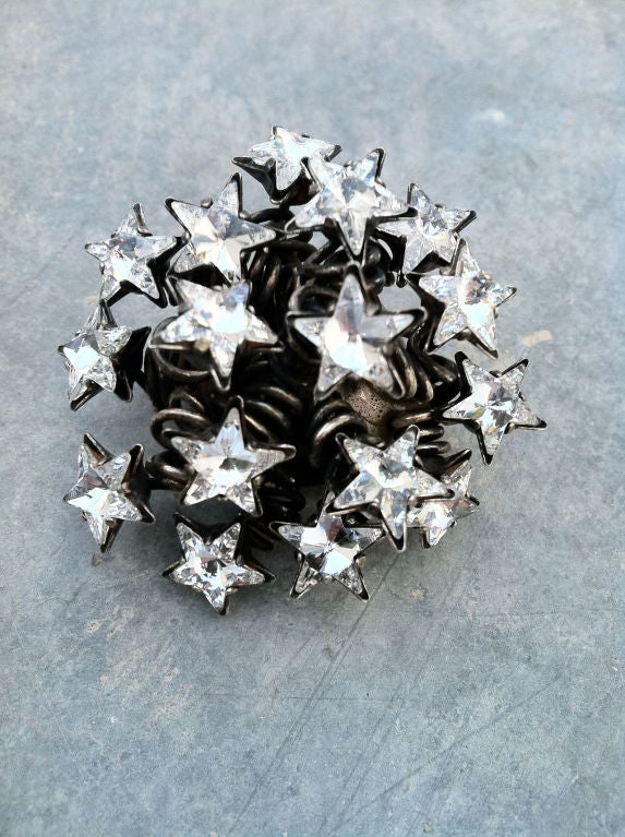 Fine vintage Dominique Aurientis 'shooting stars' brooch. Authentic signed three dimensional item retains original pin back.