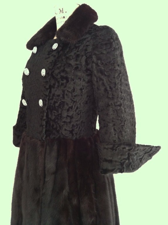 Fine vintage Swakara and mink fur coat dress. Exquisite authentic item features supple black Swakara Karakul lamb fur double breasted body, sleeves and cuffs. Gorgeous black mink fur skirt and collar. Item fully silk lined with crystal set buttons.