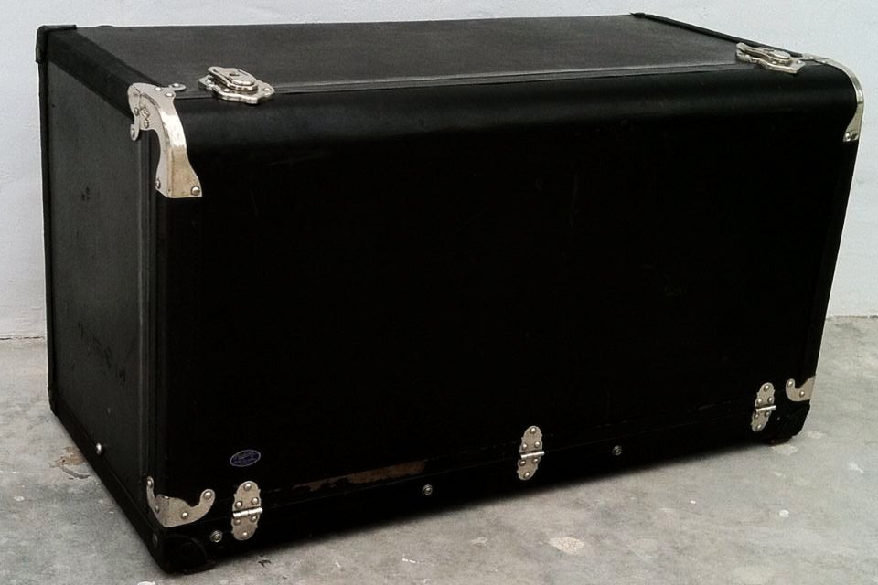 A rare vintage Packard Motors motoring trunk. Authentic canvas covered wood trunk with nickel plated hardware. All latches intact and working properly (no key). Item ideal for a coffee/cocktail table with storage..