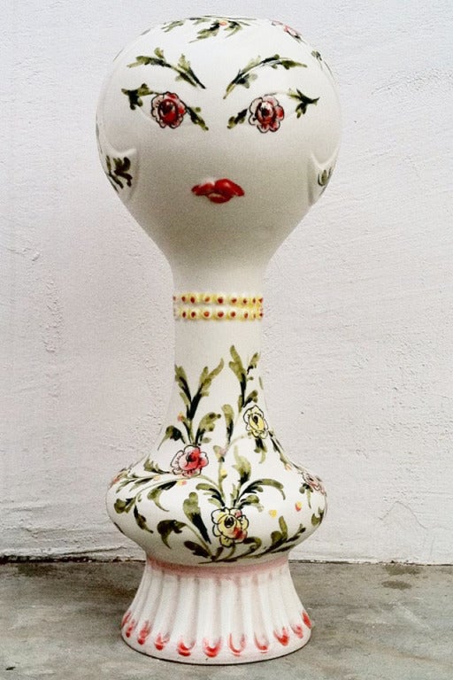A fine and rare vintage 'surrealist' hat stand. A charming hand painted ceramic stand for hat or wig (or on it's own!). A mid-century Italian modern design appropriate for any collection.