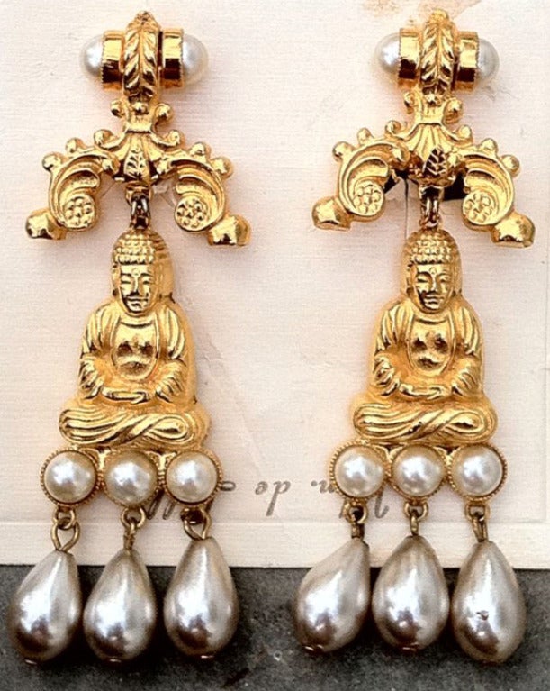 A fine and rare vintage pair illiam de Lillo 'Buddha' ear drops. Gilt metal 