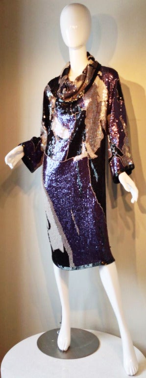 A fine and rare vintage Halston camouflage sequin cocktail dress. Fully sequin and beaded tunic item slips over head with a cowl neckline. Pristine.