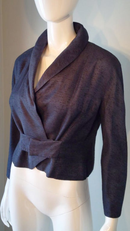 A fine and rare vintage House of Worth couture jacket. Woven silk item fully silk lined with hidden hook cinch waist.