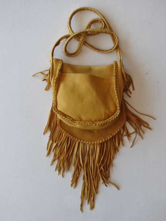 Fine vintage leather craftsman shoulder bag. Supple whipstitched & fringed deerskin with glass beads. 'Fold-over' front closure, open back pocket & 48