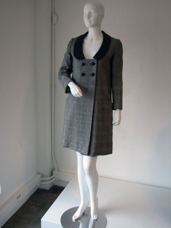 Fine & rare vintage Gerald McCann tweed & leather coat dress. Authentic English mod item. Wool tweed item fully lined with leather collar & buttons.