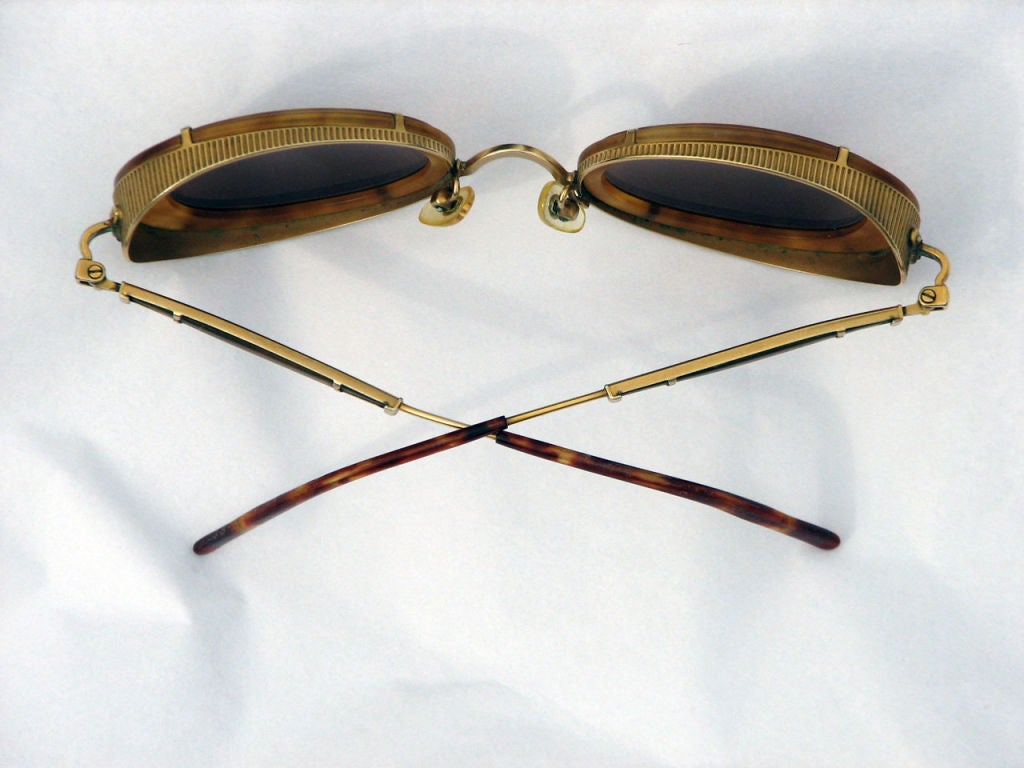 Fine vintage Matsuda 'goggle' sunglasses. Engraved gold tone metal & 'tortoise' plastic frames with amber lenses.