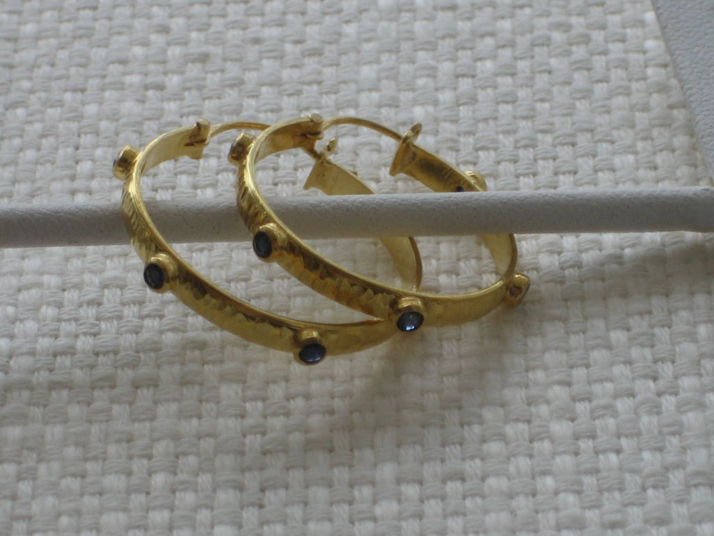 Pair of 18k Yellow Gold Hammered Hoops with Sapphires