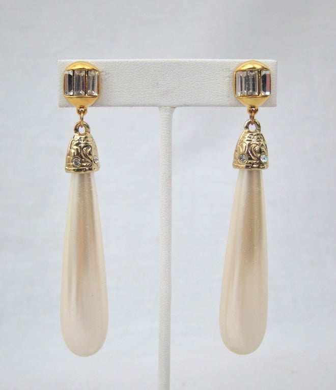 Vintage Faux pearl pierced  earrings with baguette clear stones on gold clip. Length 4