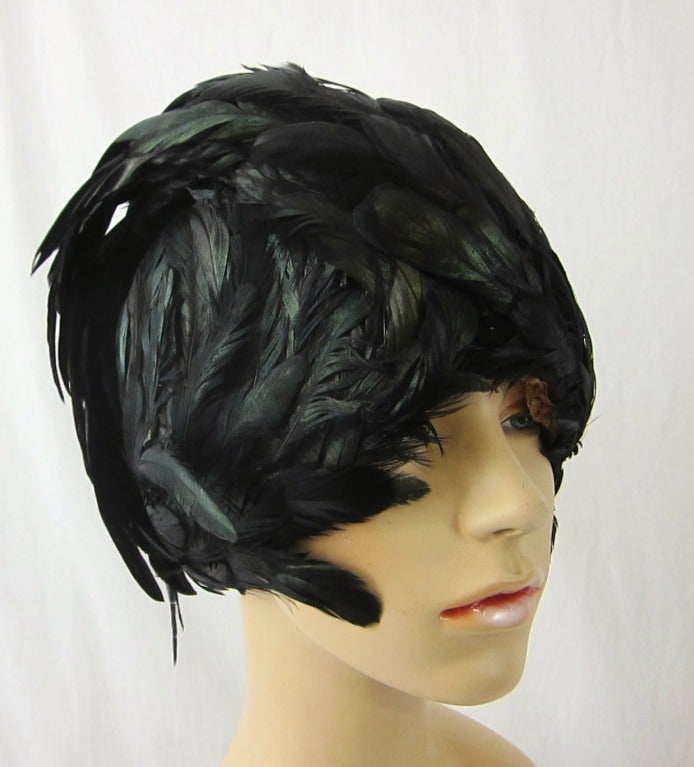 Fabulous Celebrity flapper show girl long black iridescent black feathers cloche by glamorous Jack McConnell. 

We accept pay pal..please contact shop owner with questions. 
All sales are final.