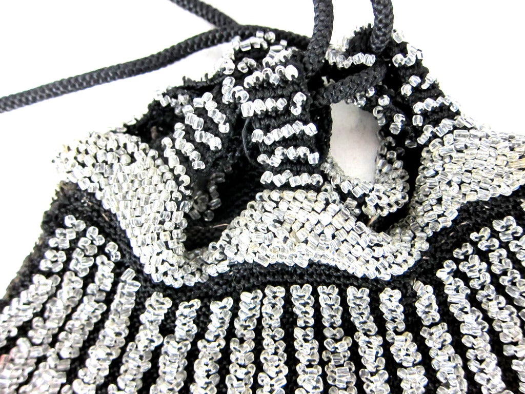 Perfect Art Deco  black and sliver glass beads draw string purse.!  Lovely beaded balls drawstring.. Your   i-phone will fit plus more! 
Putting it on the Ritz ...she's IT! 

9