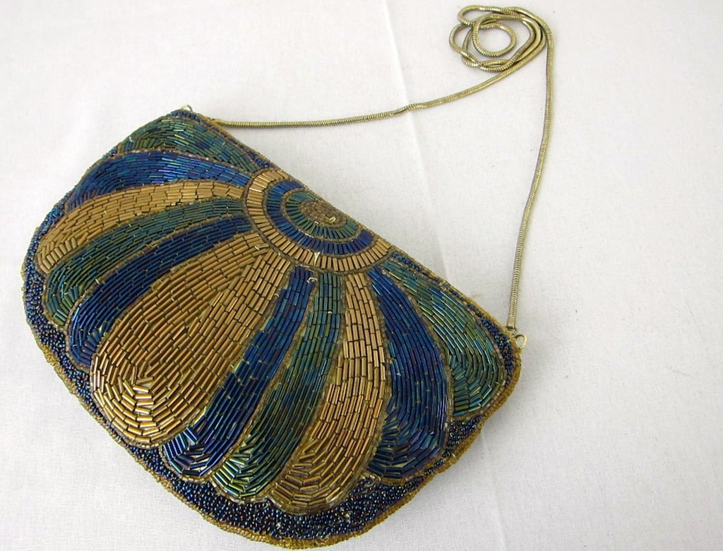 Lovely beaded Art Deco Egyptian Style Clutch Handbag Long chain strap. Deep Gold & Blues.

9