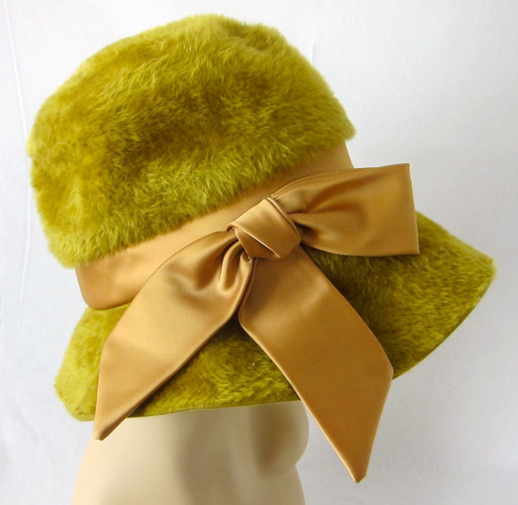 How fun is this hat for winter? Golden Mustard faux fur with golden satin bow. Size 22. Made in Italy

We accept pay pal and ship internationally.