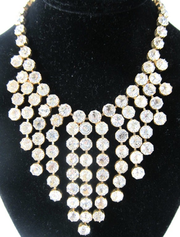 Exciting Bedazzle  Massive Festoon Necklace large prong set rhinestone and gold foil back.  Very Exciting  Runaway piece!  Signed Vogue. 
Push  closure: 

End to end 15