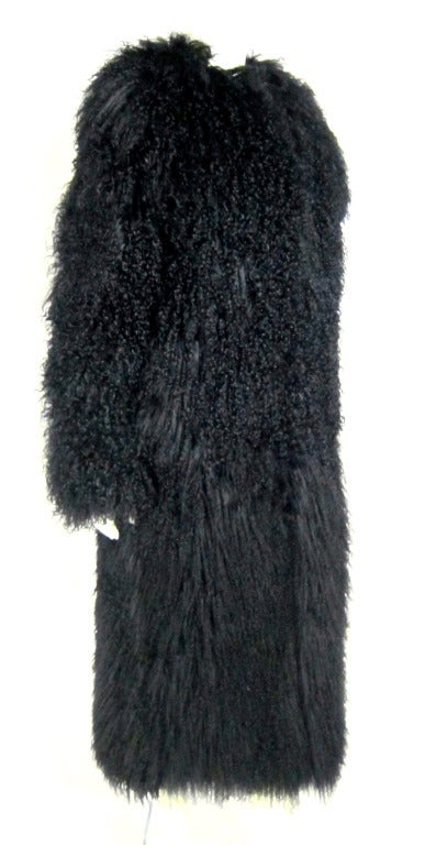 Beautiful stylish Mongolian Curly Lamb Coat by BCBG Maxazria Collection. Fully lined and pockets. Very soft and lovely! 

Bust 39