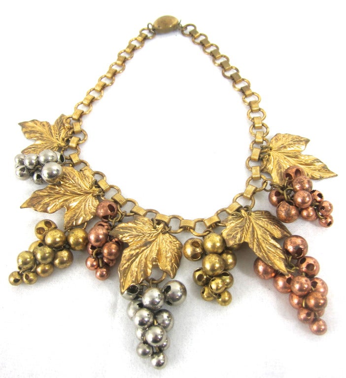 Vino I drink Vino I wear! Gold, Silver, Copper metal tones grapes and leaves round book chain necklace. A must wear for a wine country wedding or casual wine tasting weekend!

End to End 15