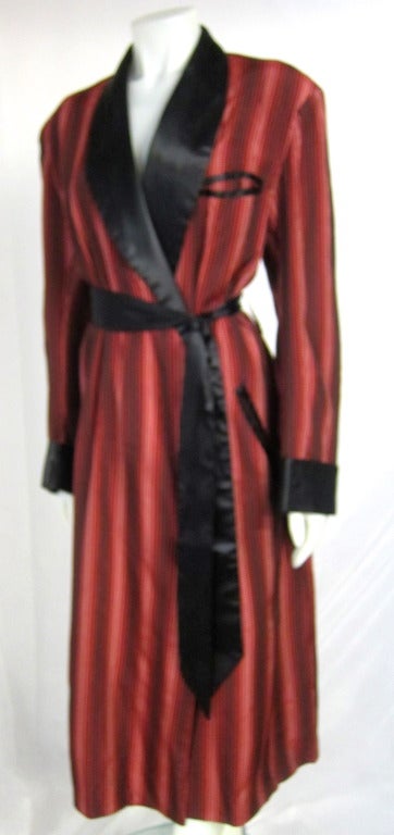 Lucy: You sure look handsome in that smoking jacket. Ricky: I do? Lucy: Yeah...I love you. Ricky: Lucy, what do you want?

Gorgeous..and not just for a man! Desi Arnez style 1940s 50s Red and Black Smoking Jacket Robe.   Beautiful fabric probably