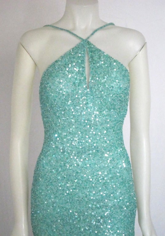 Stunning sparkling beaded dress . The color is an Aquamarine Sea foam. Vibrant and gorgeous. Fitted with flattering bodice and low back. 

Size Small-has stretch

Bust : 34
Waist: 26