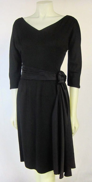 1960s Mad Men Era Black Dress with Satin Side Sash  3/4 Length Sleeves In Excellent Condition For Sale In San Francisco, CA