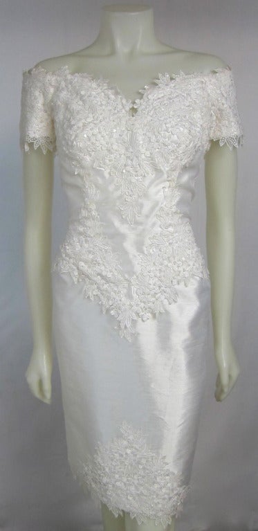 Gorgeous dress made in the USA!  White silk ( almost like a light raw silk) 39