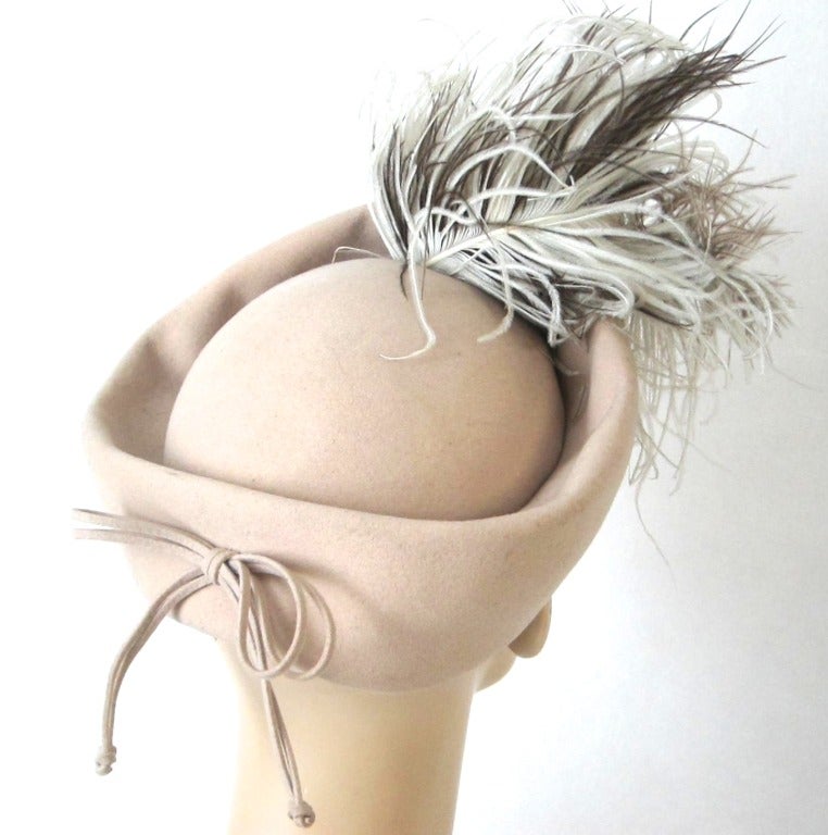 Beautiful ostrich Plums Beige Tilt Hat.