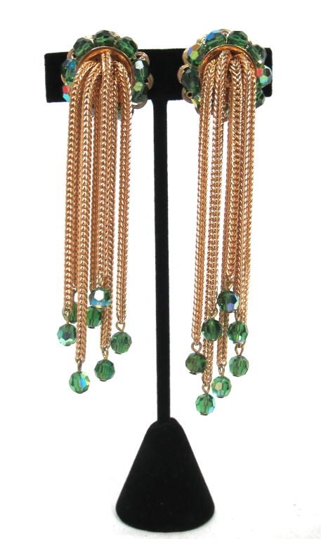 Featured are a dazzling pair of earrings by napier from the sophisticated Mad Men era. Varying lengths of rich gold tone chain and sparkling iridescent beads. Clip are strong and both are marked.<br />
<br />
5.25