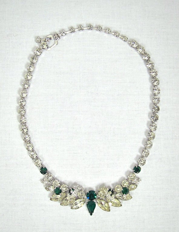 EISENBERG ICE used only the very best Austrian crystals.  This is truly an exceptional necklace-prong set clear and dark green crystal stones. 
Excellent condition.

The width is 1'
End to end 16.5