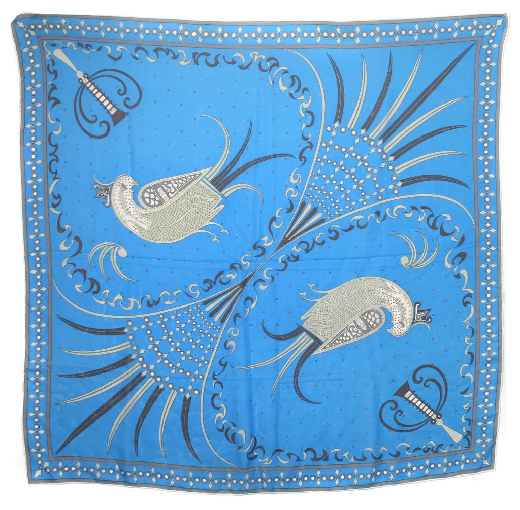 This is a beautiful blue scarf by Emilio Pucci.