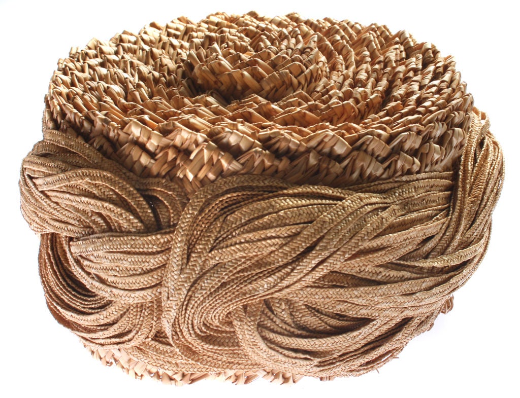 This is an interestingly woven hat by Mr. John.<br />
*Measurements*<br />
The inner dimensions of this hat are approximately 5 3/4