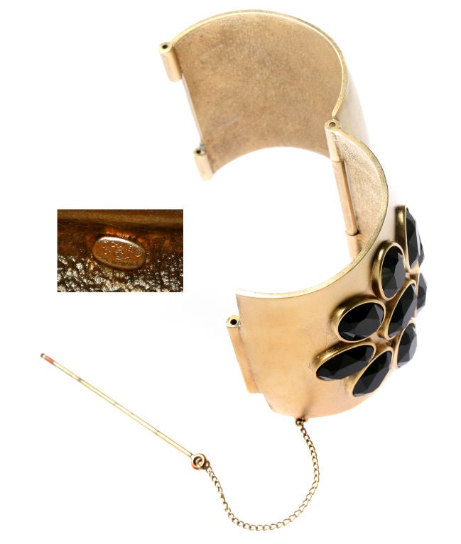 This is wonderful Chanel Bracelet looks great on. The stones are faceted and the metal is gold plated.<br />
<br />
*Measurements*<br />
The interior diameter is 7 5/8