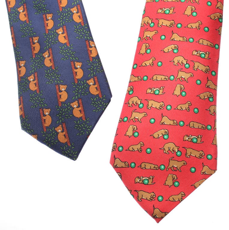 These are vintage Hermes ties with fun motifs of playful bears and puupies. Each tie is $175.<br />\r\n*Measurements*<br />\r\nbear tie 57 1/4