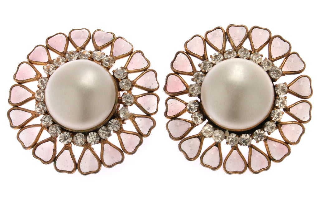 These are elegant, sophisticated and gorgeous CHANEL earrings! Faux Mabe pearls are accented by rhinestones and stylized heart shaped petals of a beautiful pale opal color poured glass.