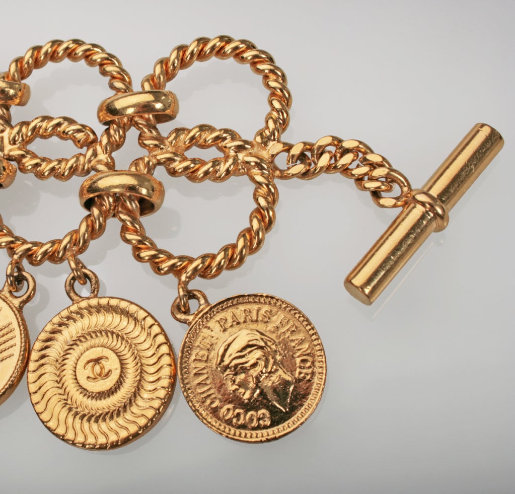 CHANEL Linked Gold Coin Bracelet In Excellent Condition In Chicago, IL