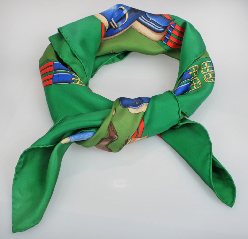 This is an attractive and colorful Hermes scarf with an Equestrian motif, appropriately called 